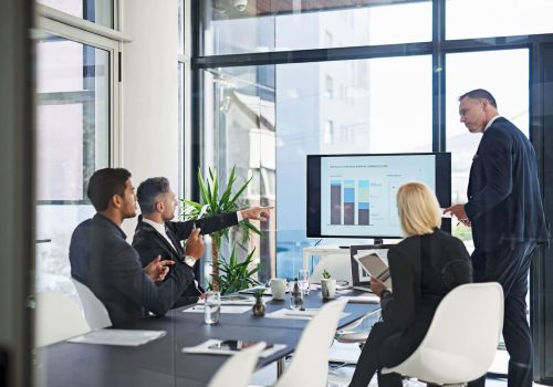 business-team-analyzes-data-during-meeting-in-offi-2026-01-09-10-27-03-utc